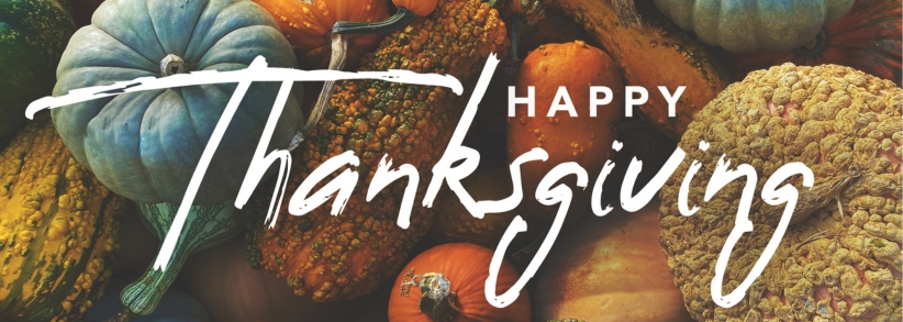 "Happy Thanksgiving" over pumpkins